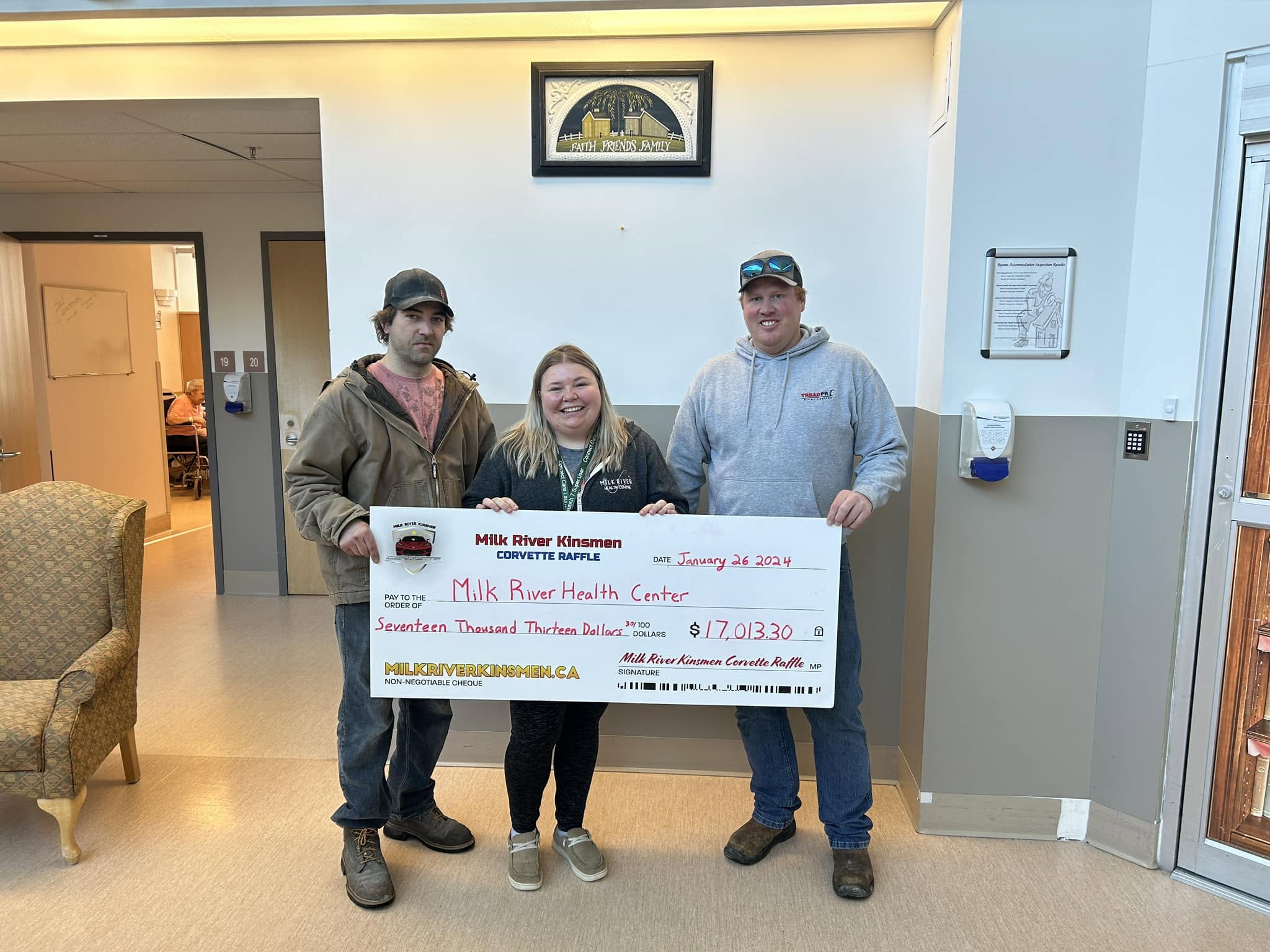 Milk River Kinsmen volunteers present a novelty cheque from the Corvette Raffle to Milk River Health Center
